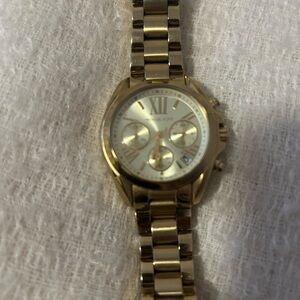 Authent ladies Micheal Kors gold watch